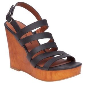 Women’s Lucky Brand Larinna adjustable strap faux wood platform heels.